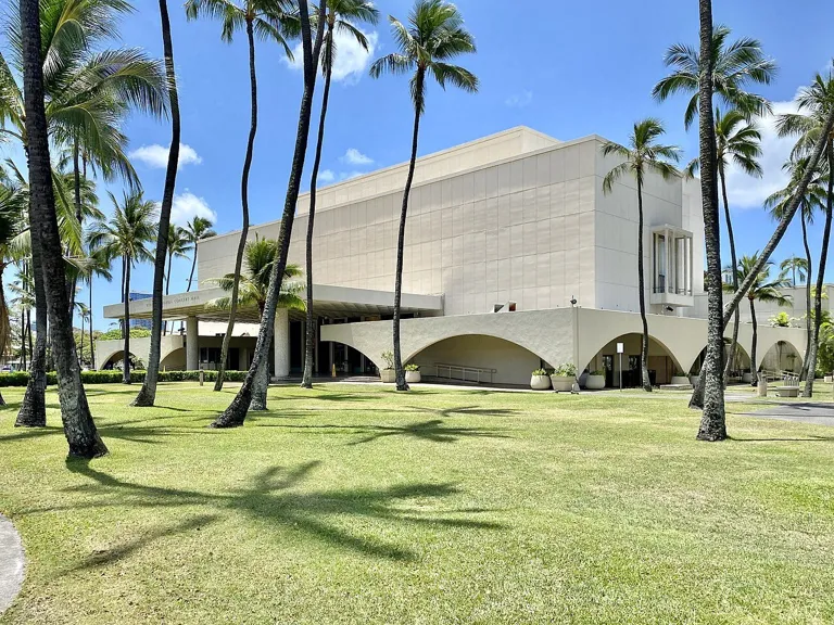 Completed in 1964, this Modern concert hall was designed by Merril, Simms &amp; Roehrig as part of a larger cultural and convention complex known as the Honolulu International Center until 1976, when it was renamed in ho
